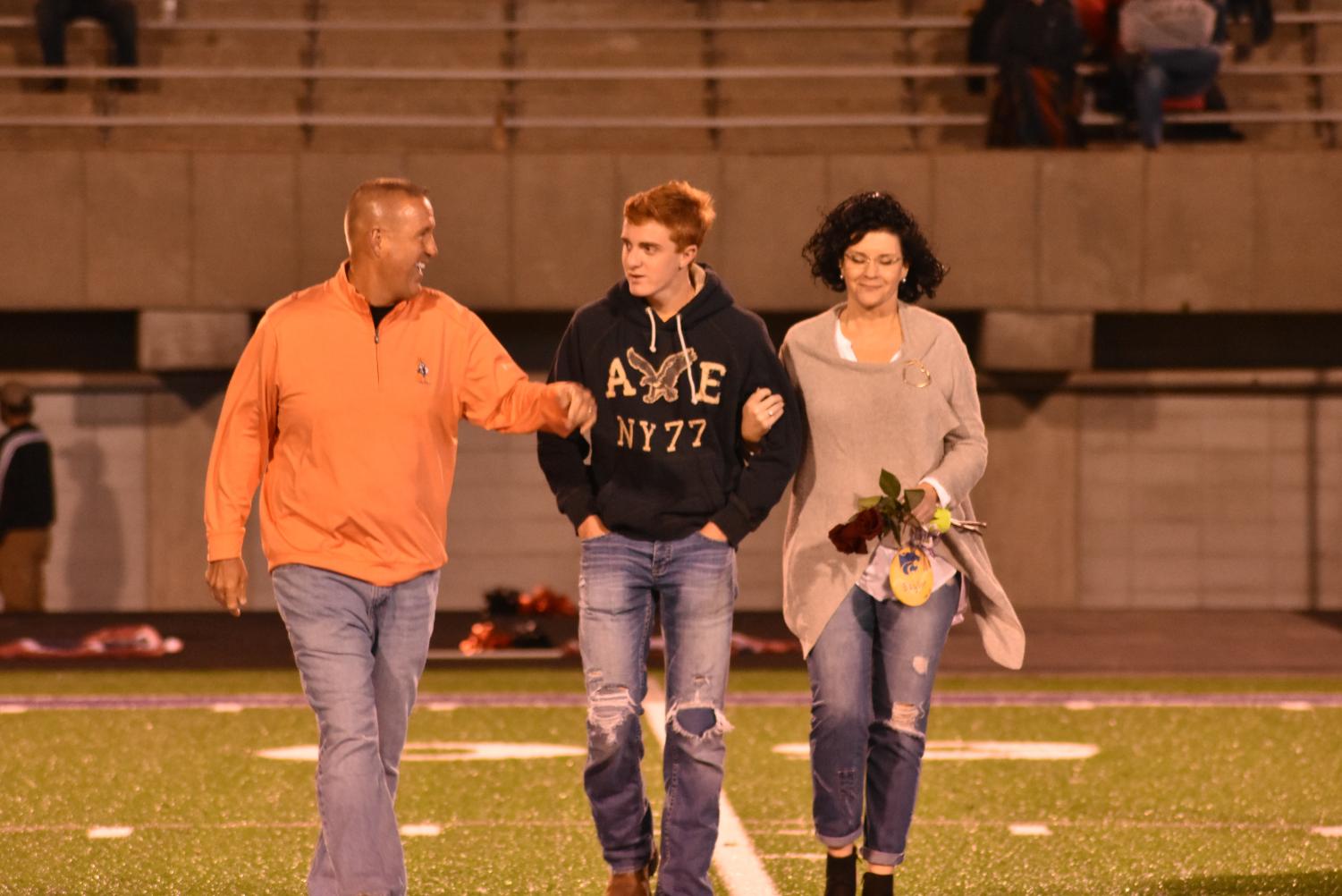 Seniors Walk The Field For Senior Night Before The Football Game Against Searcy