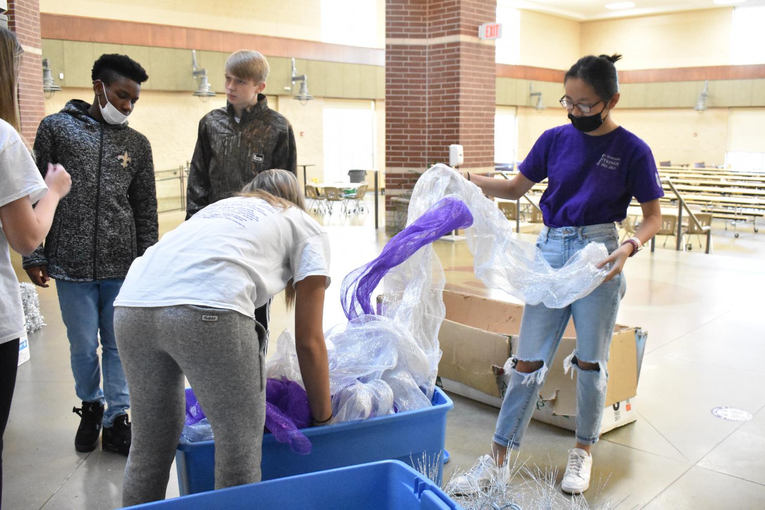 Student Council Decorates The School Christmas Tree