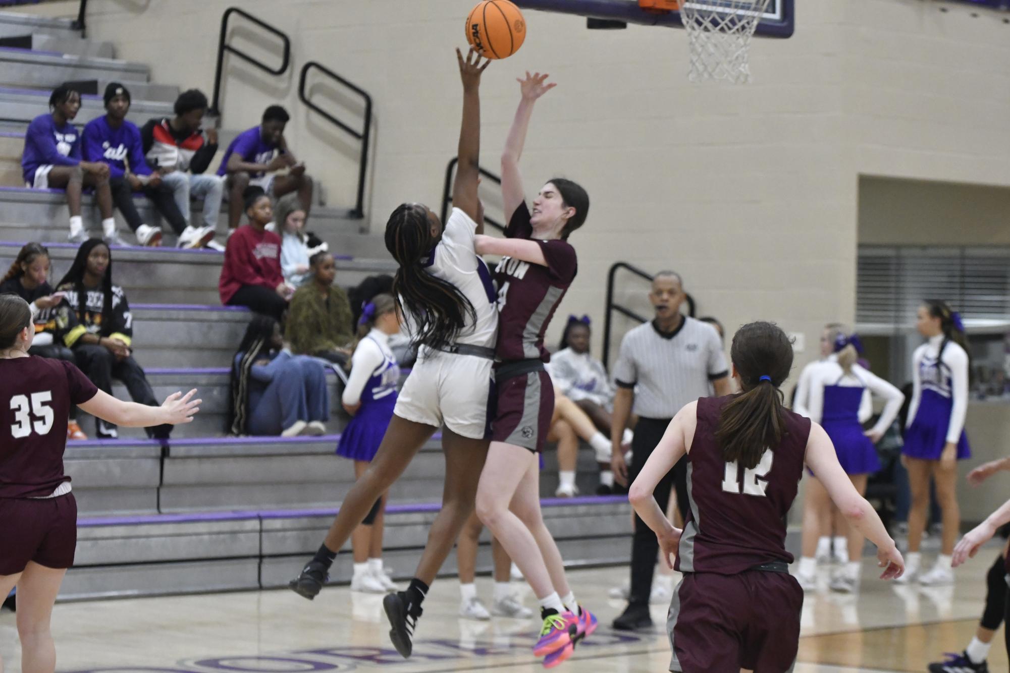 EHS Lady Cat blocking opponent